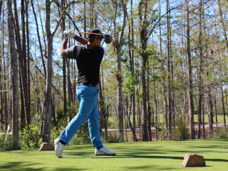 Golfer taking a swing